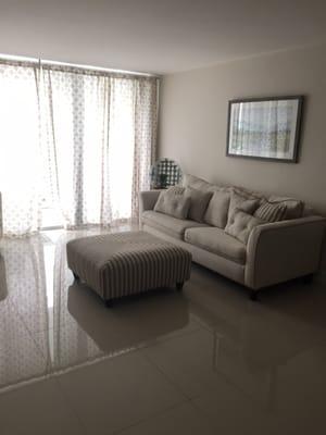 Living room with sliding glass doors to the balcony.