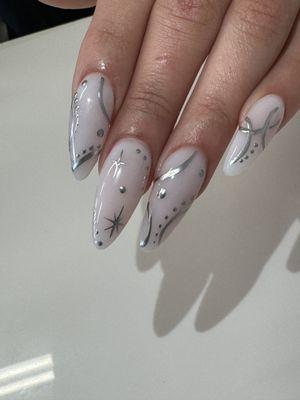 Long almond nails with hand drawn art