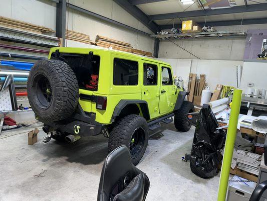 Scream n it pennywise ghostface jeep wrangler vinyl wrap 3m satin black avery lime green vehicle vinyl wrap STW Wraps and Graphics