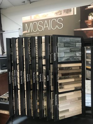 Plenty of mosaics to choose from! Glass, metal, and natural stone options. Plus, they come in different shapes and sizes!