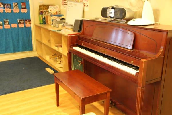 Piano in the yellow room for music time