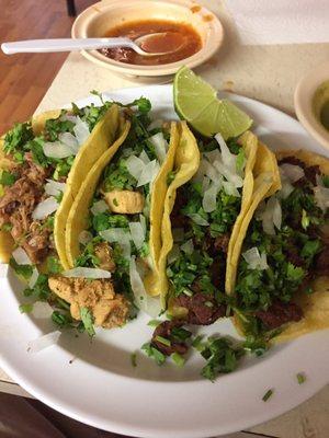 2 Beef, carnitas, and chicken tacos in corn tortillas. They're amazing