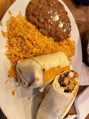 Big chicken burrito with rice and beans