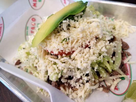 Tostada de bistec.  Crispy, crunchy.  Would be better without lettuce.