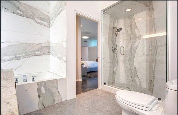 THIN PANELS MEAN NO STRUCTURAL REINFORCEMENT. 3 LBS PSF PHOTO: CALACATTA MARBLE-RESIDENTIAL MSTR. BATH