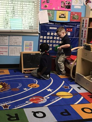 Our students engaged in a Language and Literacy Activity in their classroom.