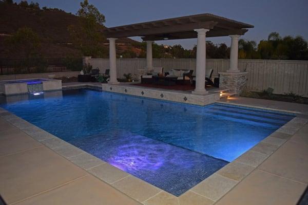 Contemporary with travertine and Pacific Stone features.