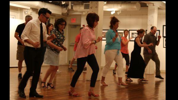 Learning a line dance at the Artfactory