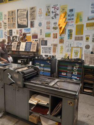 Crankable printing press the public can use after watching a demo.