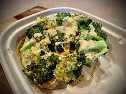 Vegan Broccoli and Cheese Baked Potato. Highly enjoyed. Great vegan cheese sauce!