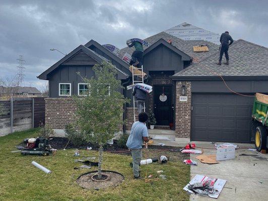 The guys hard at work on this Pflugerville home.