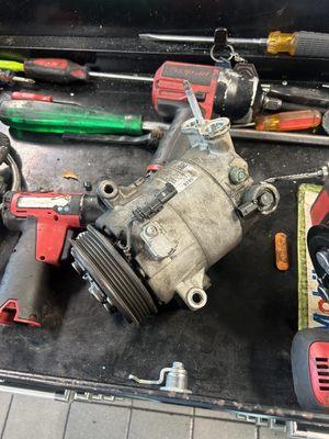 A/C compressor repair on a 2017 Sierra GMC