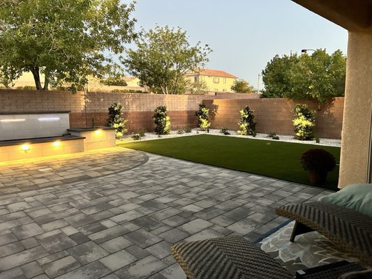 Contemporary Pavers. Turf. Plantings