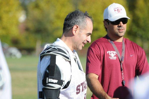 Playing lacrosse in the Stanford alumni game.