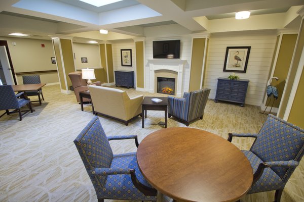 Our living rooms are equipped with large screen televisions, electric fireplaces, and game and puzzle tables.