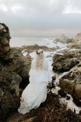 Flower crown incorporated with long braids and curls  @big Sur cliff side