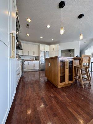 Kitchen cabinet painting and refinishing! New hardware installation and replacement.