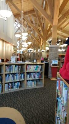 It looks like a small forest was cut down in here (if these are indeed real beams) - Milford Public Library.