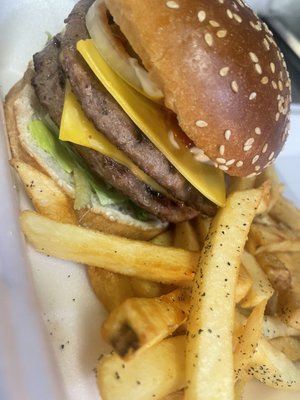 Double cheeseburger on the charbroiler 
Nothing taste better