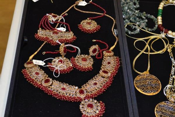 bridal jewelry 24 qarat gold foil sheet covering on it inside 60 % silver its ruby and other real stones