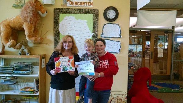 Another happy achiever of the "1,000 Books Before Kindergarten" initiative!