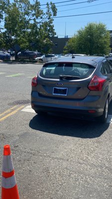 Car parked in the middle of the street second time due to engine not working