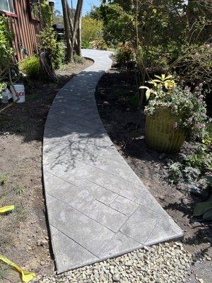 Pathway ties into patio