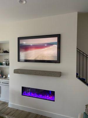 Installed electric fireplace and Samsung the frame tv.