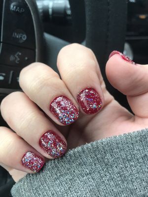 Nail polish spilling over my cuticle. Made her redo this nail twice.