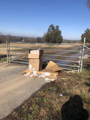 Trash dumped by salons by JC on our farm road