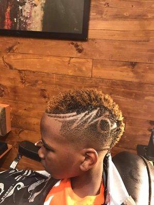 Clean mohawk with a Design as well