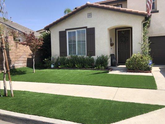 Front yard artificial turf home installation.