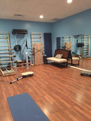 Pilates & barre class studio in back