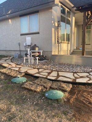 Rock walking path to pool equipment