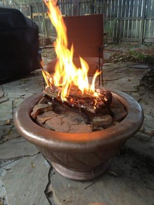 Concrete planter used as fire pit.  We love it!