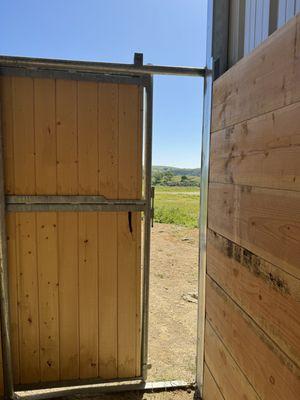 Gaps in stall doors.