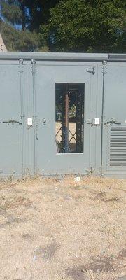 Broken door to electrical box. Very dangerous