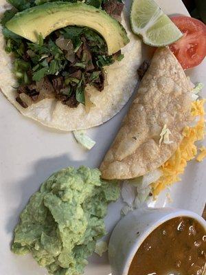 Street taco, hard taco, side of guacamole and side of charro beans