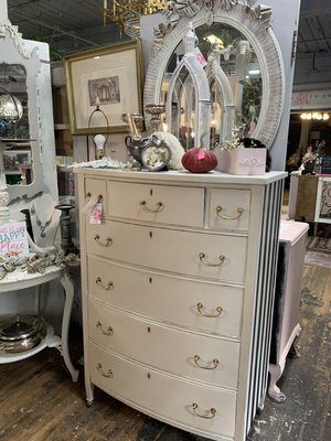 Sweet vintage tall dresser with black and white stripes on the side. Sold