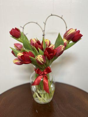 One dozen indoor grown tulips from our Garden. Please call to find out what's the color of the day