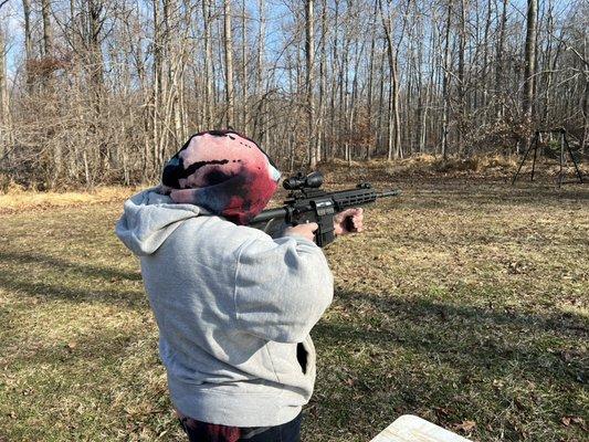 This lady is shooting an AR 15 for the first time