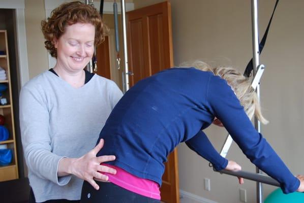 Susan teaching Cat on the trapeze table