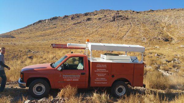 Company Vehicle on Site.  One of our grand hill top sites to cover the Valley.