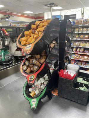 Coffee station always stocked with creamers, sugars, lids and stirring sticks.