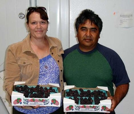 Farmers Manny & Michelle Canales delivering Boysenberries