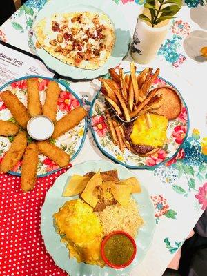 Cheese burger (chuck, brisket and short rib all ground up and smoked for an hour). Homemade Madrè enchiladas, pizza and fried pickles.