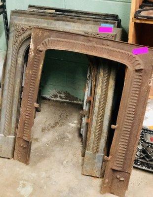 Antique metal fireplace fronts