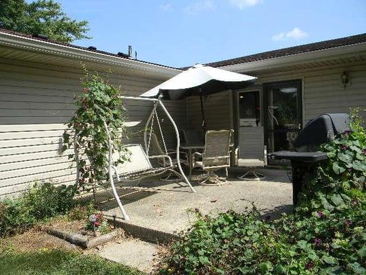 Enjoy the fall on the patio of this fenced back yard.  You will be amazed at the variety of birds which will visit you...