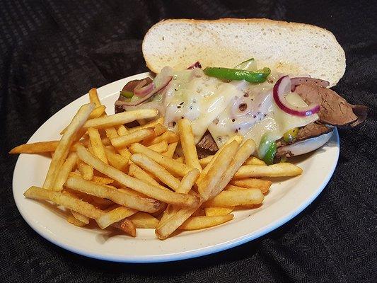 Philly Cheese - Generously piled on Beef or Chicken Philly Meat seasoned with sauteed onions and peppers.