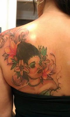 The girl was a cover up done by a chick in sac... Leo added flowers and blended down my back